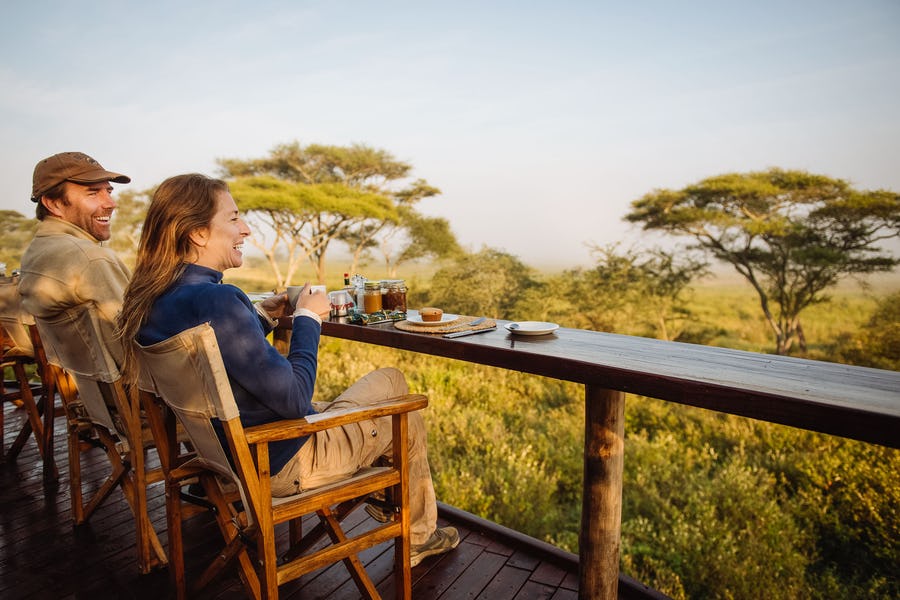 Couple enjoying a romantic safari in the Ngorongoro Crater, Tanzania